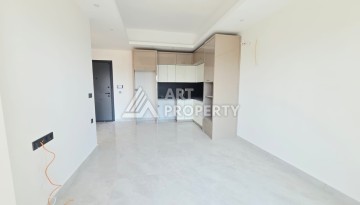 Квартира 1+1 в престижной резиденции Махмутлара, 53 кв.м. - Ракурс 2