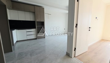 Квартира 1+1 в престижной резиденции Махмутлара, 53 кв.м. - Ракурс 3