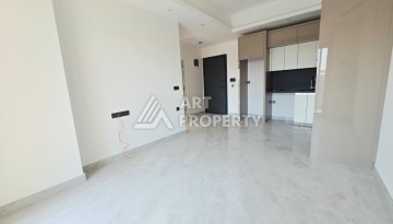 Квартира 1+1 в престижной резиденции Махмутлара, 53 кв.м. - Ракурс 4