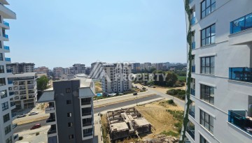 Квартира 1+1 в престижной резиденции Махмутлара, 53 кв.м. - Ракурс 7