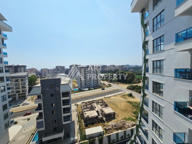 Квартира 1+1 в престижной резиденции Махмутлара, 53 кв.м. - Ракурс 6