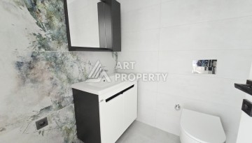 Квартира 1+1 в престижной резиденции Махмутлара, 53 кв.м. - Ракурс 8