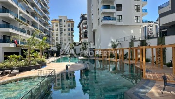 Квартира 1+1 в престижной резиденции Махмутлара, 53 кв.м. - Ракурс 23