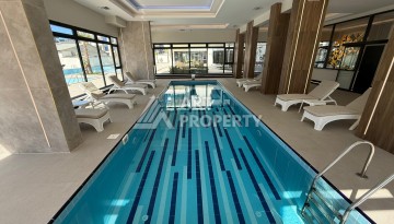Квартира 1+1 в элитном ЖК, 50 кв.м. Махмутлар, Алания - Ракурс 20
