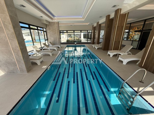 Квартира 1+1 в элитном ЖК, 50 кв.м. Махмутлар, Алания - Ракурс 19
