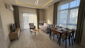 Квартира 1+1 в 5 минутах от субботнего рынка, 47 кв.м. в Махмутларе - Ракурс 1