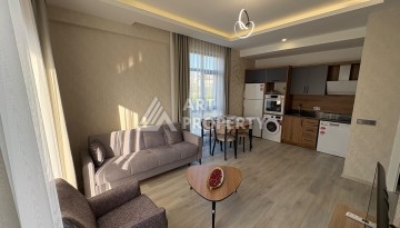 Квартира 1+1 в 5 минутах от субботнего рынка, 47 кв.м. в Махмутларе - Ракурс 2