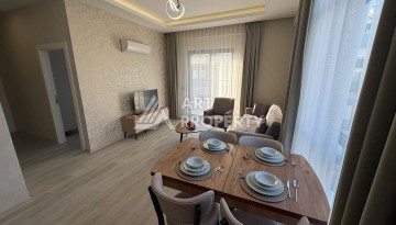 Квартира 1+1 в 5 минутах от субботнего рынка, 47 кв.м. в Махмутларе - Ракурс 4