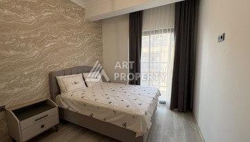 Квартира 1+1 в 5 минутах от субботнего рынка, 47 кв.м. в Махмутларе - Ракурс 8