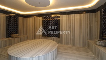 Квартира 1+1 в 5 минутах от субботнего рынка, 47 кв.м. в Махмутларе - Ракурс 26
