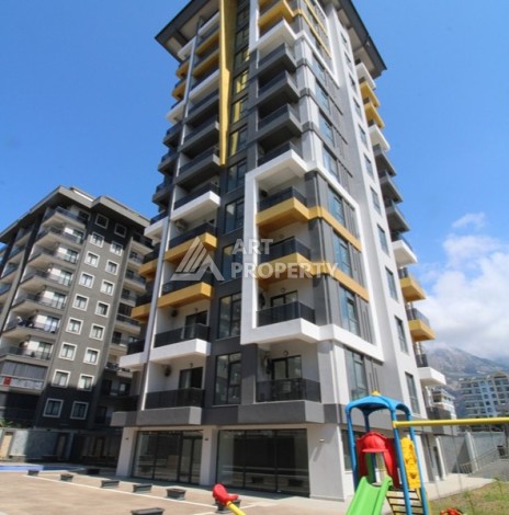 Квартира 1+1 в центре Махмутлара, 55 кв.м. Новый ЖК недалеко от Akdeniz Park - Ракурс 0