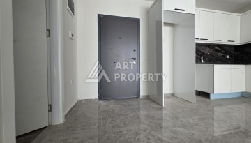 Квартира 1+1 в центре Махмутлара, 55 кв.м. Новый ЖК недалеко от Akdeniz Park - Ракурс 6