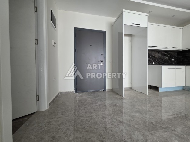 Квартира 1+1 в центре Махмутлара, 55 кв.м. Новый ЖК недалеко от Akdeniz Park - Ракурс 5
