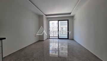 Квартира 1+1 в центре Махмутлара, 55 кв.м. Новый ЖК недалеко от Akdeniz Park - Ракурс 7