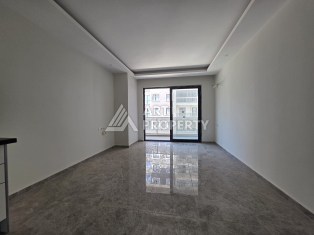 Квартира 1+1 в центре Махмутлара, 55 кв.м. Новый ЖК недалеко от Akdeniz Park - Ракурс 6