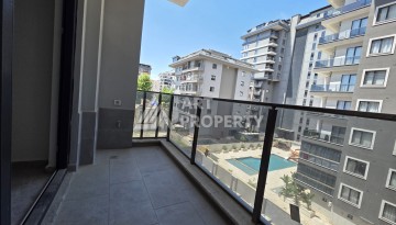 Квартира 1+1 в центре Махмутлара, 55 кв.м. Новый ЖК недалеко от Akdeniz Park - Ракурс 8