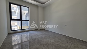 Квартира 1+1 в центре Махмутлара, 55 кв.м. Новый ЖК недалеко от Akdeniz Park - Ракурс 10