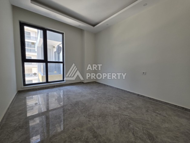 Квартира 1+1 в центре Махмутлара, 55 кв.м. Новый ЖК недалеко от Akdeniz Park - Ракурс 9