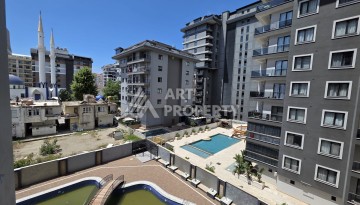 Квартира 1+1 в центре Махмутлара, 55 кв.м. Новый ЖК недалеко от Akdeniz Park - Ракурс 13