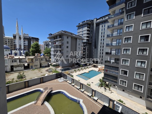 Квартира 1+1 в центре Махмутлара, 55 кв.м. Новый ЖК недалеко от Akdeniz Park - Ракурс 12