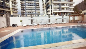 Недорогой пентхаус 2+1 в Махмутларе, в 500 метрах от моря - Ракурс 51