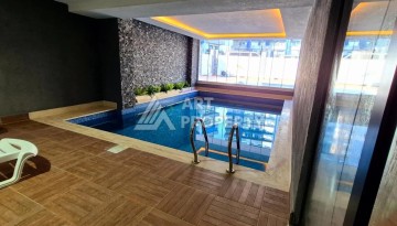 Недорогой пентхаус 2+1 в Махмутларе, в 500 метрах от моря - Ракурс 57