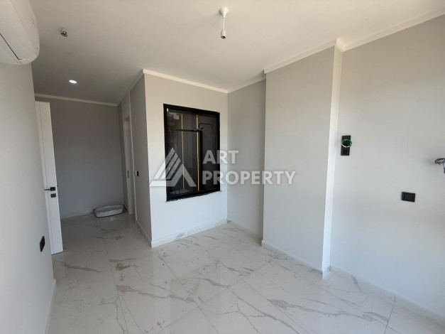 Квартира 2+1 с прямым видом на море в Махмутларе, 80 м² - Ракурс 6