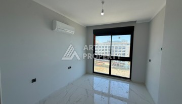 Квартира 2+1 с прямым видом на море в Махмутларе, 80 м² - Ракурс 8