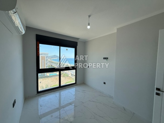 Квартира 2+1 с прямым видом на море в Махмутларе, 80 м² - Ракурс 9