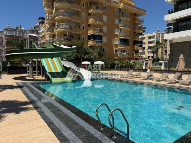Квартира 2+1 с прямым видом на море в Махмутларе, 80 м² - Ракурс 17