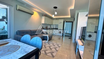 Квартира 1+1, 65 м² в 5 минутах от субботнего рынка в Махмутларе - Ракурс 11