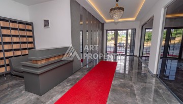 Квартиры 2+1, 3+1 и 4+1 в 700 метрах от моря.  Махмутлар, Алания - Ракурс 32