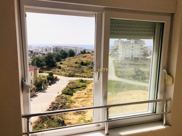 Просторная трехкомнатная квартира с инфраструктурой в зеленом районе Авсаллар, 105 м2 - Ракурс 11