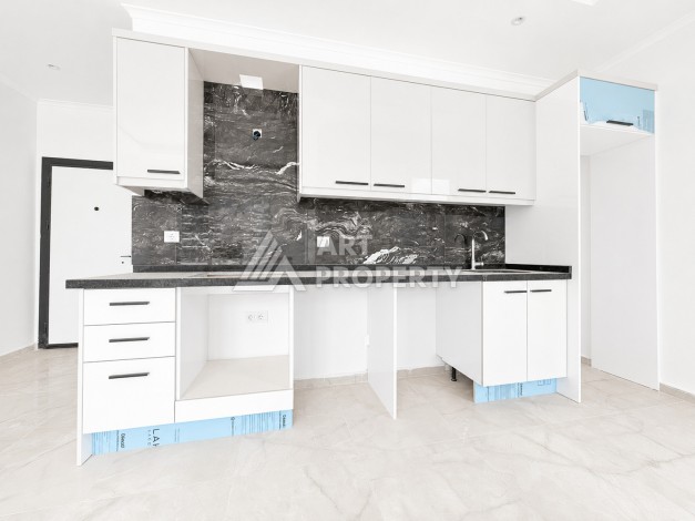 Квартира 1+1 в центре Махмутлара, в 300 м от субботнего рынка. - Ракурс 3