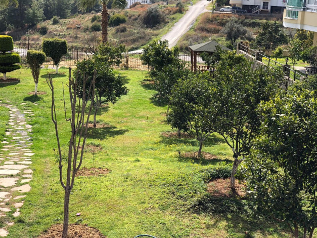 Просторная трехкомнатная квартира с инфраструктурой в зеленом районе Авсаллар, 105 м2 - Ракурс 29