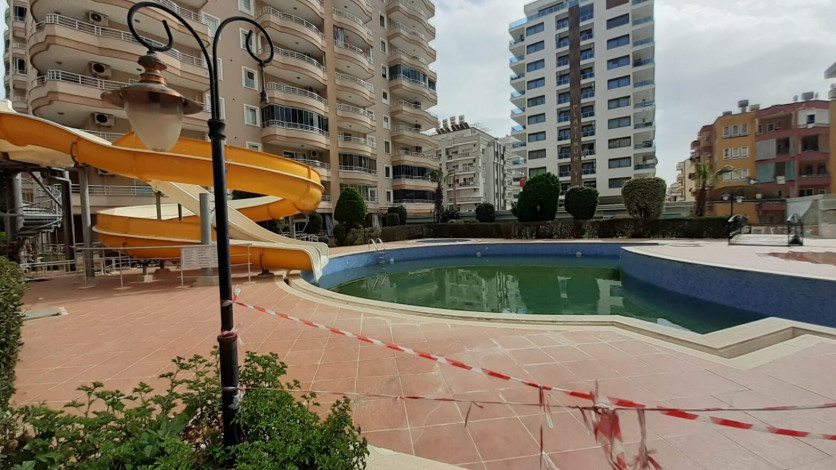 Просторная пятикомнатная квартира с хорошей инфраструктурой в Махмутлар, 240 м2 - Ракурс 18