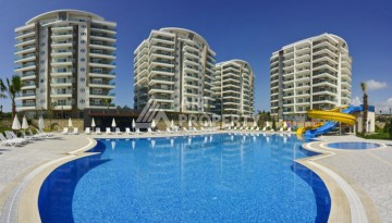 Квартира 1+1 в престижном ЖК, 68 кв.м. Авсаллар, Алания. - Ракурс 1