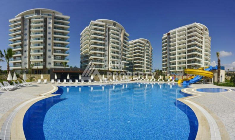 Квартира 1+1 в престижном ЖК, 68 кв.м. Авсаллар, Алания. - Ракурс 0