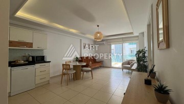 Квартира 1+1 в престижном ЖК, 68 кв.м. Авсаллар, Алания. - Ракурс 4