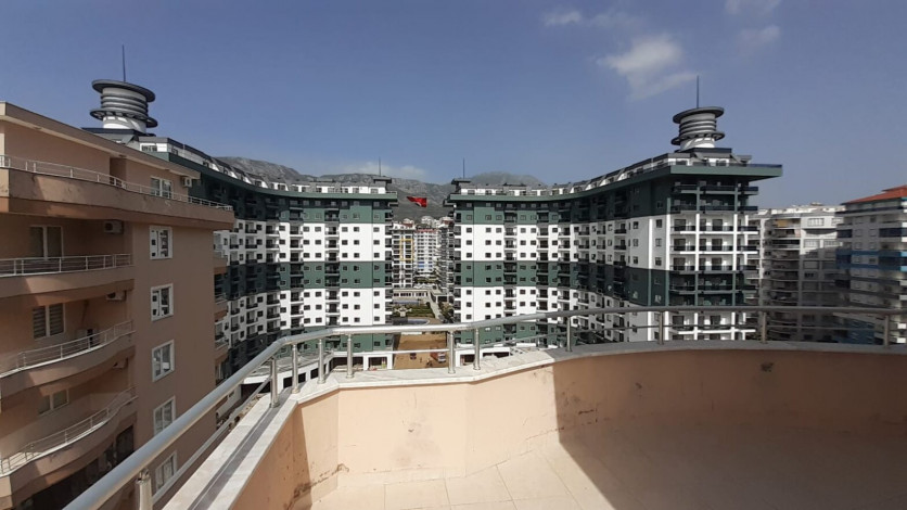 Просторная пятикомнатная квартира с хорошей инфраструктурой в Махмутлар, 240 м2 - Ракурс 41