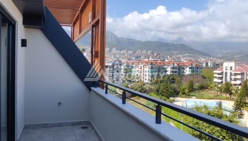 Квартиры 1+1 и 2+1 в ЖК элит-класса в районе Оба, Алания - Ракурс 22