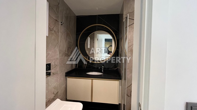 Меблированная квартира 2+1 у моря в Обагёль, 80 м² - Ракурс 9