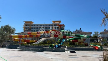 Просторная квартира 1+1 в элитном комплексе в Тюрклере, Алания - Ракурс 3