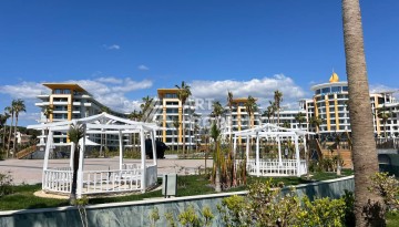 Просторная квартира 1+1 в элитном комплексе в Тюрклере, Алания - Ракурс 10