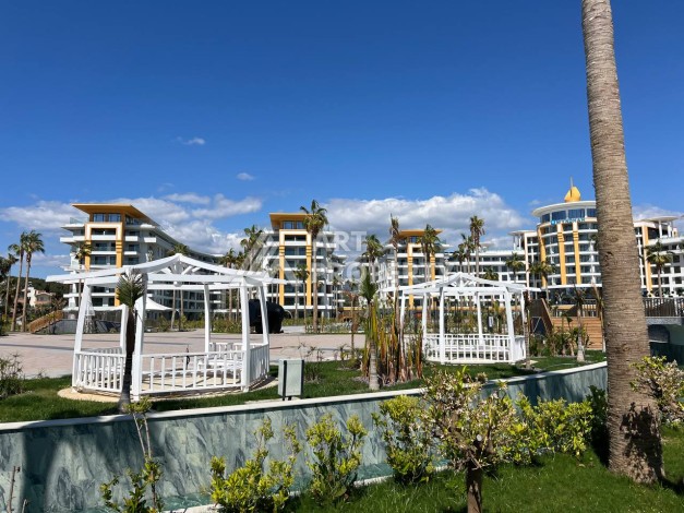 Просторная квартира 1+1 в элитном комплексе в Тюрклере, Алания - Ракурс 9