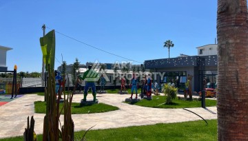 Просторная квартира 1+1 в элитном комплексе в Тюрклере, Алания - Ракурс 11