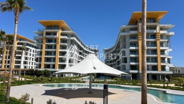 Просторная квартира 1+1 в элитном комплексе в Тюрклере, Алания - Ракурс 12