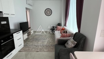 Светлая квартира 1+1 в Махмутларе, 65 кв.м. Элитный ЖК - Ракурс 9