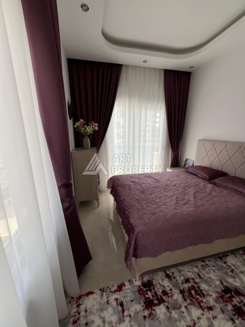 Светлая квартира 1+1 в Махмутларе, 65 кв.м. Элитный ЖК - Ракурс 9