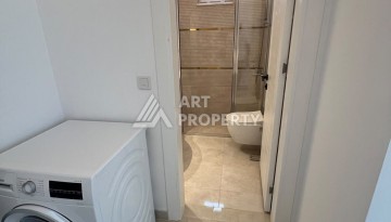Светлая квартира 1+1 в Махмутларе, 65 кв.м. Элитный ЖК - Ракурс 11